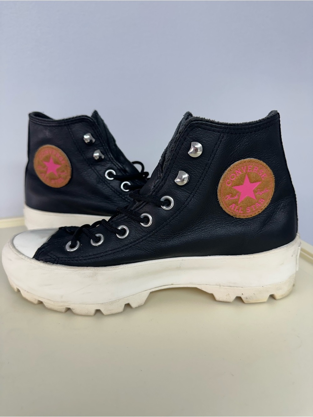Converse Black High-Top Platform Sneakers with Pink Star Patch
